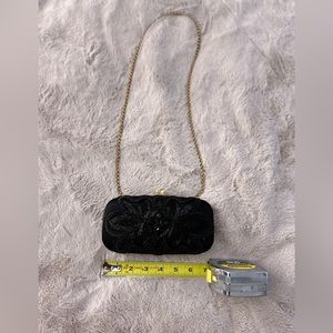 Oscar de la renta black clutch